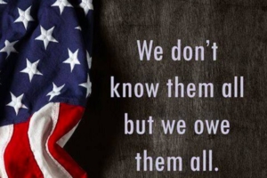 An American flag beside the words: We don't know them all but we owe them all